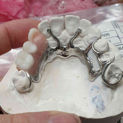 KMO Dental Laboratory - Denture Repairs- New Dentures made