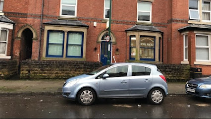 M Afzal BDS (Newcastle)